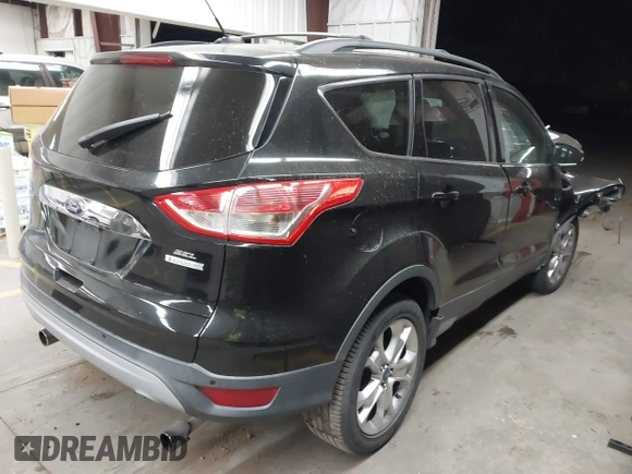 2013 Ford Escape SEL with VIN 1FMCU0H95DUD10644, listed as a IAAI auction lot 41517697 with 82,278 mi miles. Bid and sale history available at carsss.com. Image 4.