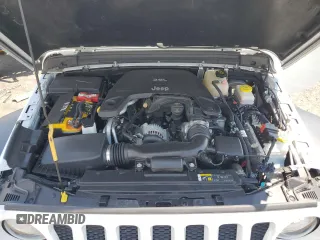 2020 Jeep Wrangler Unlimited Sport S with VIN 1C4HJXDG7LW144226, listed as a Copart auction lot 65087935 with 77,815 mi miles and Salvage title. Bid and sale history available at DreamBid. Image 12.