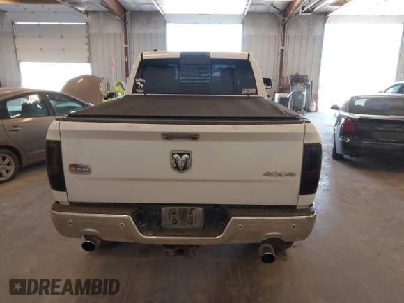 2015 Ram 1500 Laramie Limited with VIN 1C6RR7WM6FS678840, listed as a IAAI auction lot 42040449 with Not provided miles and . Bid and sale history available at DreamBid. Image 16.