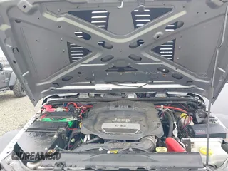 2018 Jeep Wrangler Unlimited Sport S with VIN 1C4BJWDG4JL861052, listed as a IAAI auction lot 42100517 with 43,907 mi miles and . Bid and sale history available at DreamBid. Image 10.