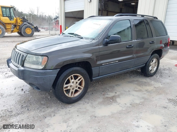 2004 Jeep Grand Cherokee Laredo with VIN 1J4GX48N74C412982, listed as a IAAI auction lot 41496258 with 195,671 mi miles. Bid and sale history available at carsss.com. Image 2.