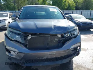 2016 Honda Pilot EX-L with VIN 5FNYF6H56GB007650, listed as a IAAI auction lot 42343914 with 147,354 mi miles and . Bid and sale history available at DreamBid. Image 12.