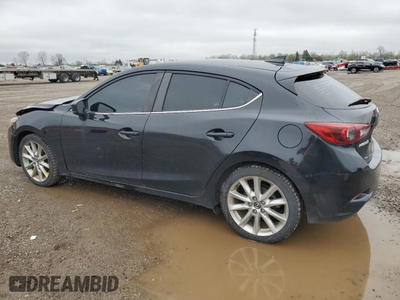 2017 Mazda 3 Grand Touring z VIN JM1BN1M33H1119719, wystawiony jako Copart lot #55728905 z przebiegiem 217 372 mil mil oraz Szkoda całkowita • Salvage title. Historia ofert i sprzedaży dostępna na DreamBid. Obrazek 2.