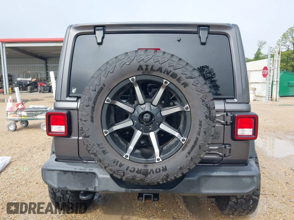 2021 Jeep Wrangler Unlimited Sport S with VIN 1C4HJXDG2MW700461, listed as a IAAI auction lot 41894307 with 82,454 mi miles. Bid and sale history available at carsss.com. Image 16.