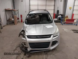 2013 Ford Escape SE with VIN 1FMCU9GX7DUB89197, listed as a IAAI auction lot 42311546 with 131,263 mi miles and . Bid and sale history available at DreamBid. Image 13.