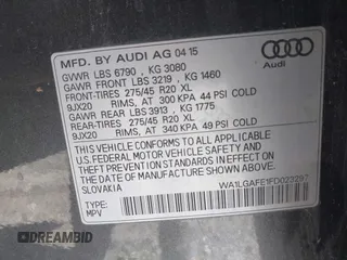 2015 Audi Q7 Premium Plus z VIN WA1LGAFE1FD023297, wystawiony jako IAAI lot #42128488 z przebiegiem 173 407 mil mil oraz . Historia ofert i sprzedaży dostępna na DreamBid. Obrazek 9.