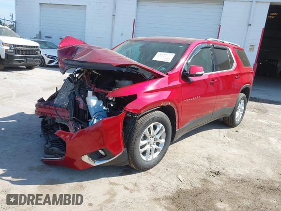 2021 Chevrolet Traverse LT Cloth with VIN 1GNEVGKW1MJ100973, listed as a IAAI auction lot 41477074 with 56,167 mi miles. Bid and sale history available at carsss.com. Image 17.