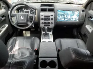 2008 Mercury Mariner Premier z VIN 4M2CU97178KJ40982, wystawiony jako Copart lot #51683375 z przebiegiem 127 132 mil mil oraz Szkody całkowita. Historia ofert i sprzedaży dostępna na DreamBid. Obrazek 8.