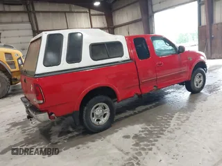 1999 Ford F-150 z VIN 1FTRX18WXXNA73861, wystawiony jako IAAI lot #42517576 z przebiegiem Nie podano mil oraz . Historia ofert i sprzedaży dostępna na DreamBid. Obrazek 4.