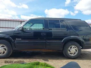 1997 Oldsmobile Bravada z VIN 1GHDT13W3V2707243, wystawiony jako IAAI lot #42024114 z przebiegiem 185 219 mil mil oraz . Historia ofert i sprzedaży dostępna na DreamBid. Obrazek 14.
