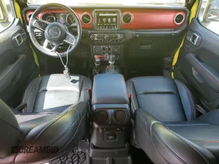 2022 Jeep Wrangler Unlimited Rubicon with VIN 1C4HJXFG3NW214174, listed as a Copart auction lot 74136484 with 5,292 mi miles and Salvage title. Bid and sale history available at DreamBid. Image 8.