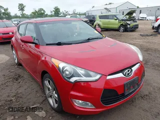 2014 Hyundai Veloster RE:FLEX z VIN KMHTC6AD4EU215076, wystawiony jako IAAI lot #42359840 z przebiegiem 100 393 mil mil oraz . Historia ofert i sprzedaży dostępna na DreamBid. Obrazek 1.