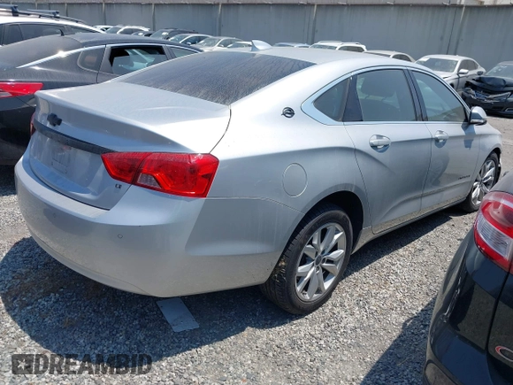 2016 Chevrolet Impala LT with VIN 2G1105SA5G9185565, listed as a IAAI auction lot 42430184 with 143,791 mi miles and . Bid and sale history available at DreamBid. Image 4.
