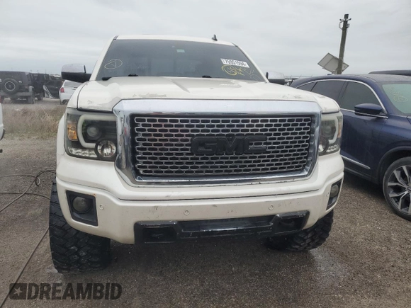 2014 GMC Sierra 1500 Denali z VIN 3GTP1WEC9EG329719, wystawiony jako Copart lot #75951594 z przebiegiem 139 234 mil mil oraz Nie do naprawy • Non repairable. Historia ofert i sprzedaży dostępna na DreamBid. Obrazek 5.