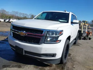 2019 Chevrolet Tahoe LT with VIN 1GNSKBKC7KR307869, listed as a IAAI auction lot 41833834 with 127,949 mi miles. Bid and sale history available at carsss.com. Image 12.