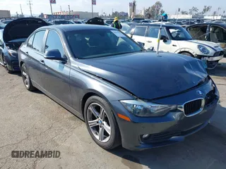 2015 BMW 3 Series 320i with VIN WBA3B1C55FK140317, listed as a IAAI auction lot 41434306 with 120,627 mi miles. Bid and sale history available at carsss.com. Image 1.