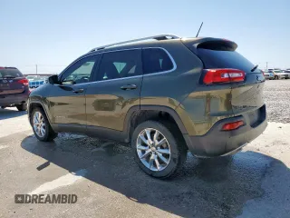 2015 Jeep Cherokee Limited with VIN 1C4PJLDB3FW572761, listed as a Copart auction lot 52529045 with 101,302 mi miles and Salvage Title. Bid and sale history available at DreamBid. Image 2.