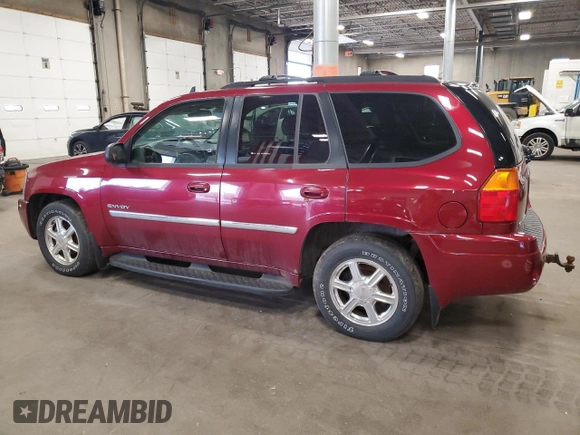 2006 GMC Envoy SLE with VIN 1GKDT13S062263876, listed as a Copart auction lot 60245185 with 156,567 mi miles and Clean title. Bid and sale history available at DreamBid. Image 2.