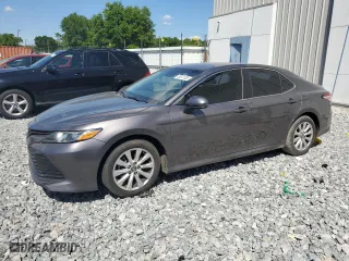 2018 Toyota Camry LE with VIN 4T1B11HK1JU023813, listed as a Copart auction lot 50871305 with 218,192 mi miles and Clean Title. Bid and sale history available at carsss.com. Image 1.