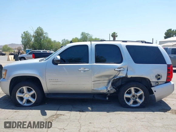 2012 Chevrolet Tahoe LT z VIN 1GNSCBE06CR255554, wystawiony jako IAAI lot #42544690 z przebiegiem 136 070 mil mil oraz . Historia ofert i sprzedaży dostępna na DreamBid. Obrazek 14.