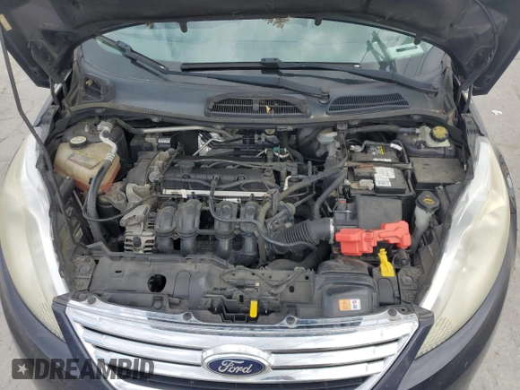 2012 Ford Fiesta SE z VIN 3FADP4BJ8CM194262, wystawiony jako Copart lot #56685845 z przebiegiem 367 579 mil mil oraz Szkoda całkowita • Salvage title. Historia ofert i sprzedaży dostępna na DreamBid. Obrazek 11.