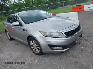 2013 Kia Optima EX z VIN 5XXGN4A70DG251141, wystawiony jako IAAI lot #42410478 z przebiegiem 245 963 mil mil oraz . Historia ofert i sprzedaży dostępna na DreamBid. Obrazek 1.