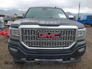 2017 GMC Sierra 1500 Denali z VIN 3GTU2PEJXHG304823, wystawiony jako IAAI lot #42293712 z przebiegiem 185 809 mil mil oraz . Historia ofert i sprzedaży dostępna na DreamBid. Obrazek 12.
