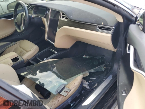 2016 Tesla Model S 90D с VIN 5YJSA1E27GF125739, выставлен на аукционе Copart как лот 75074624 с пробегом Не указан миль и Списание • Salvage title. История ставок и продаж доступна на DreamBid. Изображение 8.