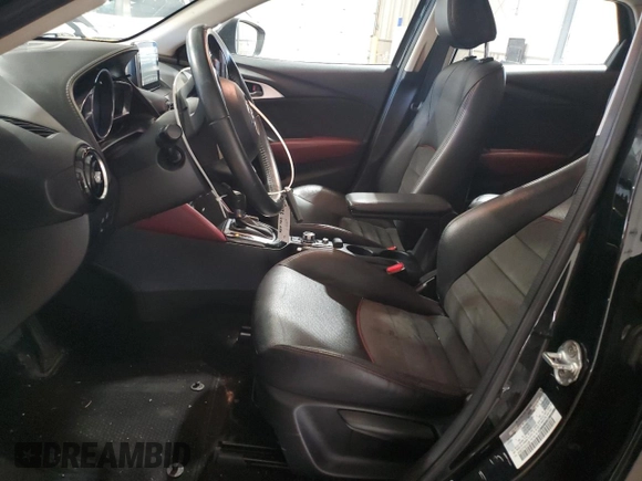 2017 Mazda CX-3 Grand Touring z VIN JM1DKFD71H0141595, wystawiony jako Copart lot #54377305 z przebiegiem 60 907 mil mil oraz Szkody całkowita. Historia ofert i sprzedaży dostępna na DreamBid. Obrazek 7.