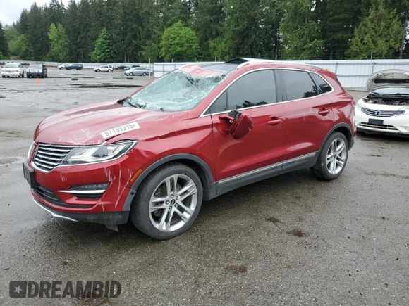 2015 Lincoln MKC z VIN 5LMTJ2AHXFUJ10820, wystawiony jako Copart lot #57139315 z przebiegiem 128 714 mil mil oraz Szkody całkowita. Historia ofert i sprzedaży dostępna na DreamBid. Obrazek 1.