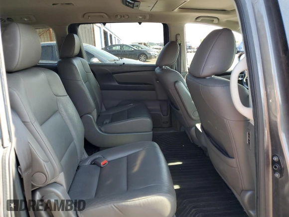 2016 Honda Odyssey Touring Elite with VIN 5FNRL5H91GB092214, listed as a Copart auction lot 61158745 with 121,477 mi miles and Salvage title. Bid and sale history available at DreamBid. Image 11.