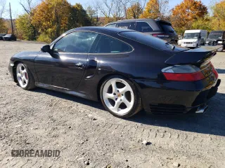 2002 Porsche 911 Carrera S with VIN WP0AB29902S686463, listed as a Copart auction lot 77560164 with 64,080 mi miles and Clean Title. Bid and sale history available at carsss.com. Image 2.