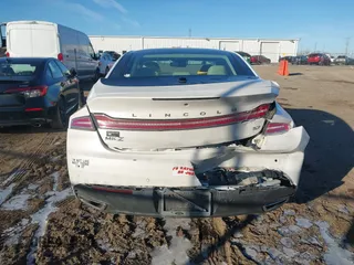2014 Lincoln MKZ with VIN 3LN6L2GK3ER800458, listed as a IAAI auction lot 41233924 with 106,048 mi miles. Bid and sale history available at carsss.com. Image 16.