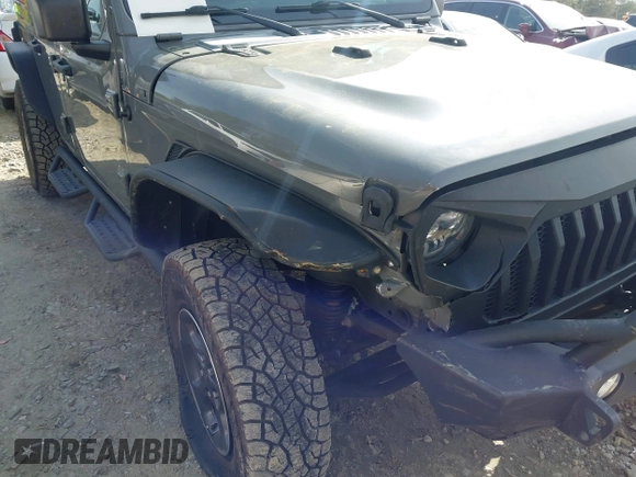 2019 Jeep Wrangler Unlimited Sport Altitude with VIN 1C4HJXDG3KW639148, listed as a IAAI auction lot 41933844 with 57,184 mi miles and . Bid and sale history available at DreamBid. Image 18.