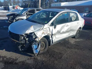 2011 Nissan Versa S with VIN 3N1BC1AP5BL423246, listed as a IAAI auction lot 41329258 with Not provided miles and . Bid and sale history available at DreamBid. Image 2.