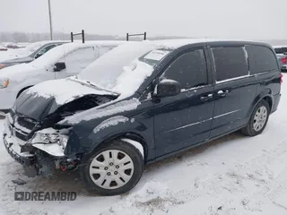 2013 Dodge Grand Caravan SE with VIN 2C4RDGBGXDR746630, listed as a IAAI auction lot 41239381 with 213,421 mi miles and . Bid and sale history available at DreamBid. Image 2.