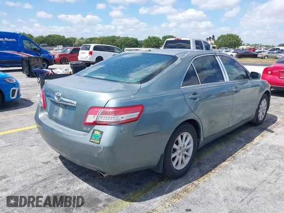 2010 Toyota Camry with VIN 4T1BF3EKXAU555983, listed as a IAAI auction lot 42112803 with 125,061 mi miles and . Bid and sale history available at DreamBid. Image 4.