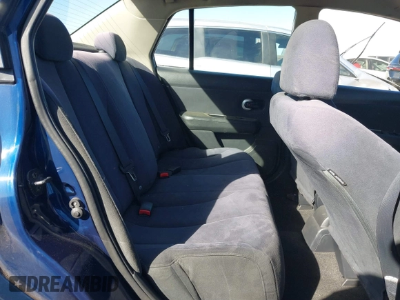 2009 Nissan Versa 1.8 S with VIN 3N1BC11E29L360857, listed as a IAAI auction lot 40629379 with 114,499 mi miles. Bid and sale history available at carsss.com. Image 8.