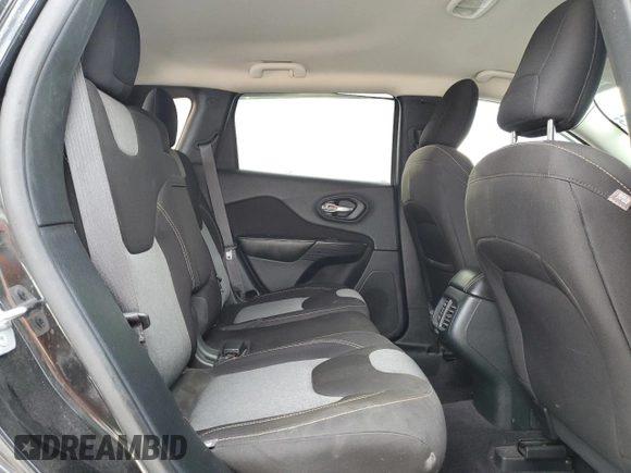 2016 Jeep Cherokee Sport z VIN 1C4PJLAB6GW208758, wystawiony jako Copart lot #53544355 z przebiegiem 103 505 mil mil oraz Szkoda całkowita • Salvage title. Historia ofert i sprzedaży dostępna na DreamBid. Obrazek 11.