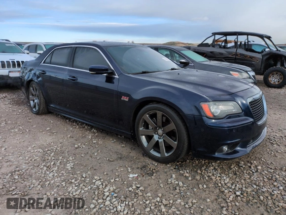 2013 Chrysler 300 SRT-8 z VIN 2C3CCAFJ4DH735421, wystawiony jako Copart lot #50936775 z przebiegiem 113 701 mil mil oraz Szkoda całkowita • Salvage title. Historia ofert i sprzedaży dostępna na DreamBid. Obrazek 4.