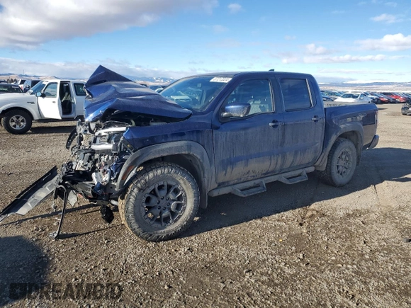 2023 Nissan Frontier Pro-4X z VIN 1N6ED1EK0PN610517, wystawiony jako Copart lot #87213324 z przebiegiem 51 648 mil mil oraz Szkoda całkowita • Salvage title. Historia ofert i sprzedaży dostępna na DreamBid. Obrazek 1.