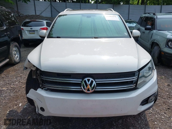 2014 Volkswagen Tiguan SEL with VIN WVGAV3AX7EW022239, listed as a IAAI auction lot 42381670 with 180,729 mi miles and . Bid and sale history available at DreamBid. Image 12.