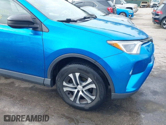 2018 Toyota RAV4 LE with VIN JTMBFREV8JJ220630, listed as a IAAI auction lot 42001795 with 86,027 mi miles. Bid and sale history available at carsss.com. Image 18.