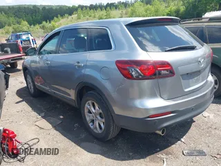 2015 Mazda CX-9 Touring with VIN JM3TB2CA2F0451180, listed as a IAAI auction lot 42180078 with 112,804 mi miles and . Bid and sale history available at carsss.com. Image 3.
