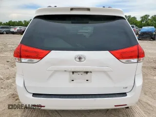 2014 Toyota Sienna LE AAS with VIN 5TDKK3DC1ES424249, listed as a Copart auction lot 62114525 with 193,301 mi miles and Salvage title. Bid and sale history available at DreamBid. Image 6.