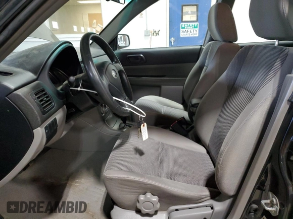 2007 Subaru Forester X with VIN JF1SG63637H705612, listed as a Copart auction lot 76387234 with 136,300 mi miles and Salvage Title. Bid and sale history available at carsss.com. Image 7.