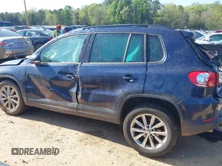 2015 Volkswagen Tiguan SE z VIN WVGBV7AX3FW583163, wystawiony jako IAAI lot #41991409 z przebiegiem 99 866 mil mil oraz . Historia ofert i sprzedaży dostępna na DreamBid. Obrazek 15.