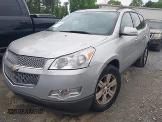 2012 Chevrolet Traverse 1LT with VIN 1GNKRGED5CJ255266, listed as a IAAI auction lot 42093175 with 103,730 mi miles and . Bid and sale history available at DreamBid. Image 2.