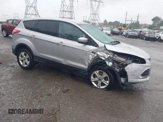 2016 Ford Escape SE z VIN 1FMCU9G95GUC64436, wystawiony jako IAAI lot #42340428 z przebiegiem 128 223 mil mil oraz . Historia ofert i sprzedaży dostępna na DreamBid. Obrazek 1.