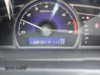 2006 Honda Civic LX with VIN 1HGFA16586L104230, listed as a IAAI auction lot 42215822 with 128,704 mi miles and . Bid and sale history available at DreamBid. Image 7.